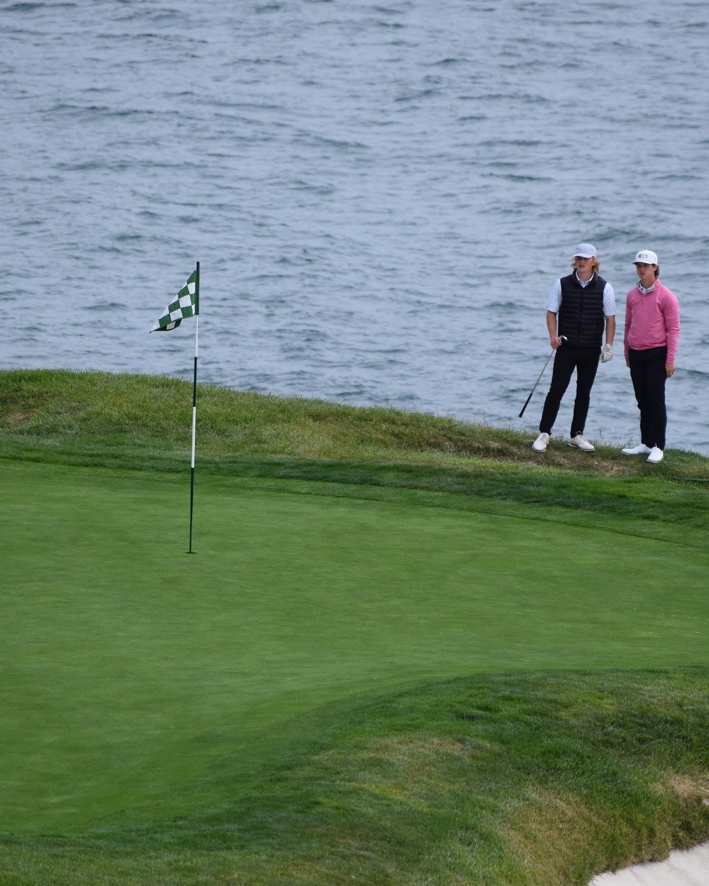 Here is a photo of Eric and his brother at the historic hole #7 at Pebble Beach Golf Links.