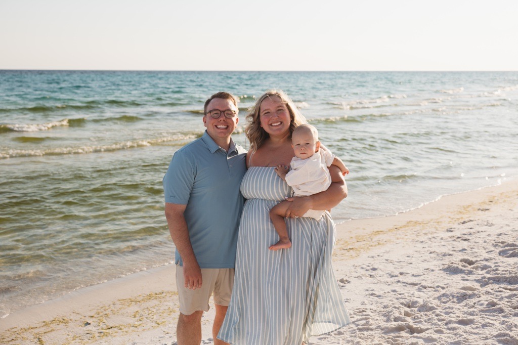 Family photo of Ray, Christa, and Harvey